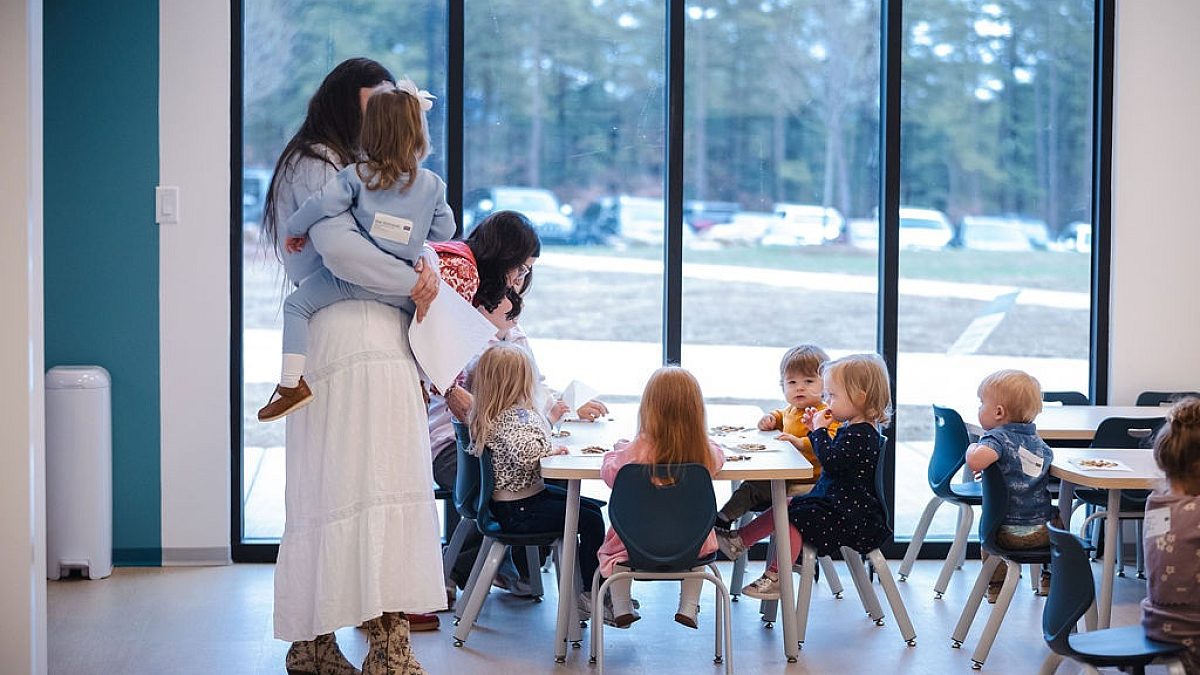 Kids at table in classrooom