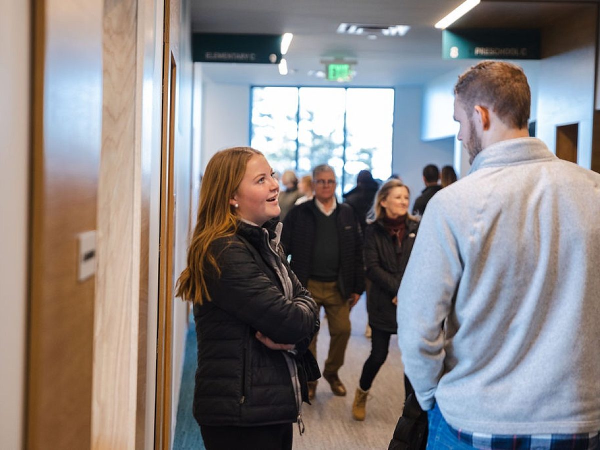 Hallway Student Pastor Talking