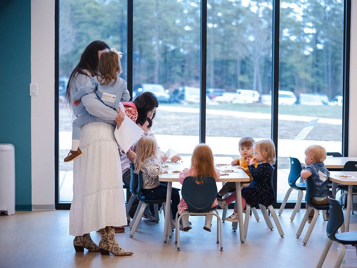 Kids at table in classrooom