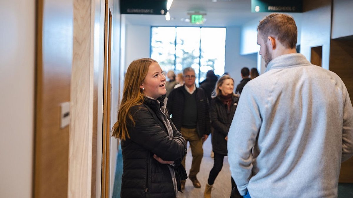 Hallway Student Pastor Talking